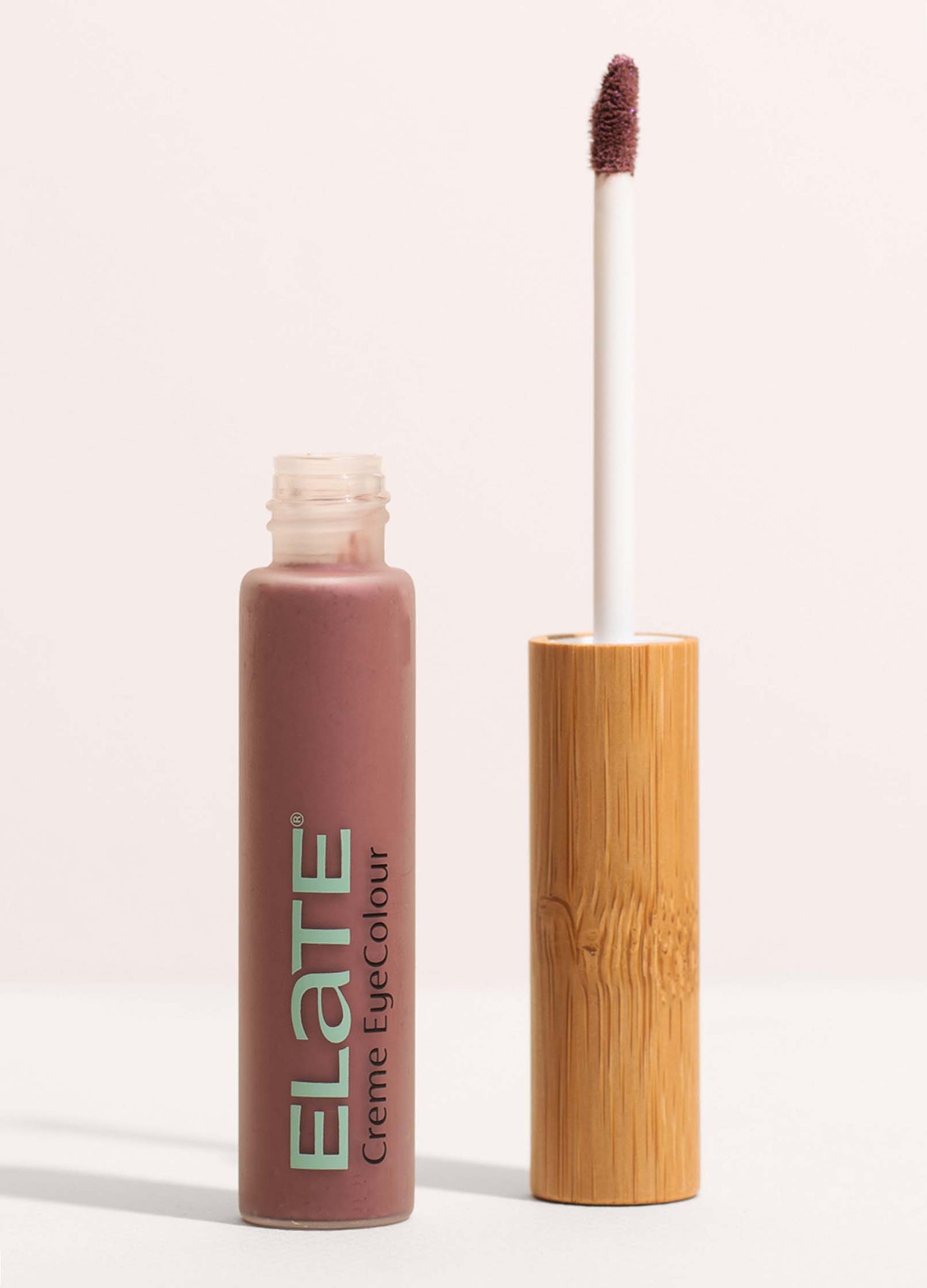 Elate Cosmetics Creme EyeColour open glass tube with bamboo applicator handle - kind