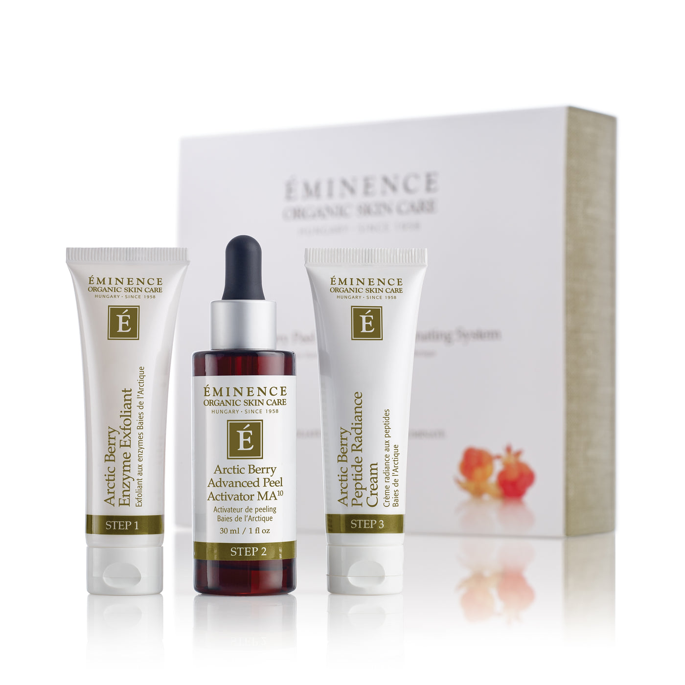 Eminence Organics Arctic Berry Peel & Peptide Illuminating System showing all three products and the box: Arctic Berry Enzyme Exfoliant, Arctic Berry Advanced Peel Activator, Arctic Berry Peptide Radiance Cream